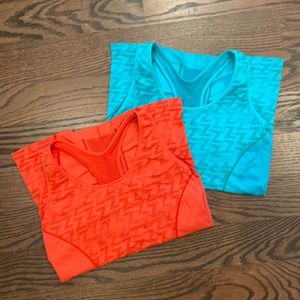 2 Zella racerback tanks with built in shelf bra in excellent condition